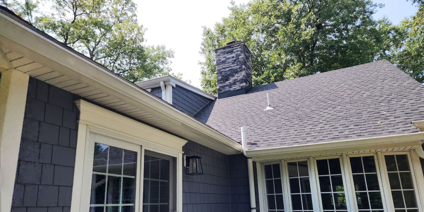 The Role of Gutters in Preserving Roof Longevity