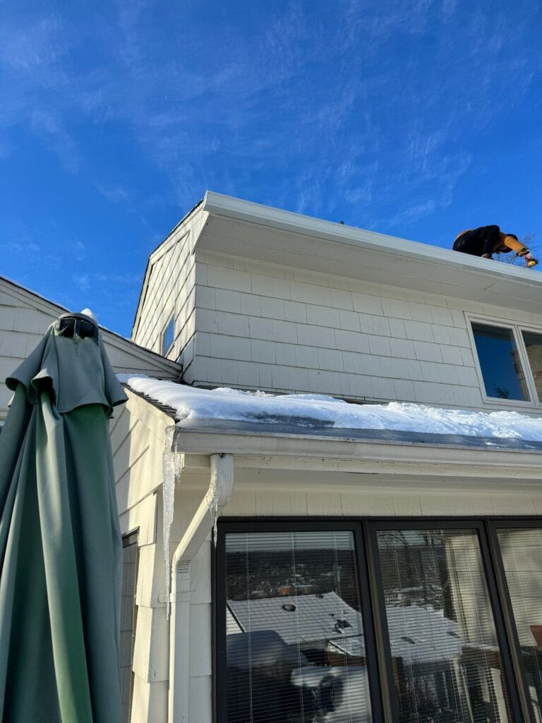 Stop Ice Dams with Clean Gutters