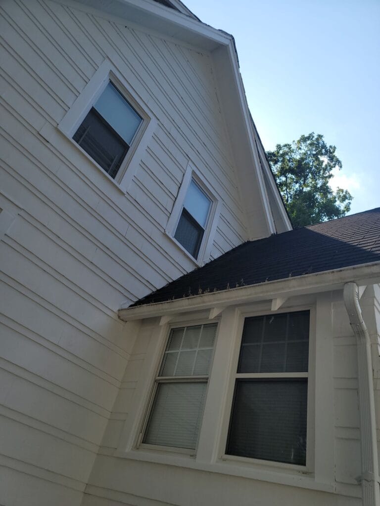Seamless gutter installed along roof edge
