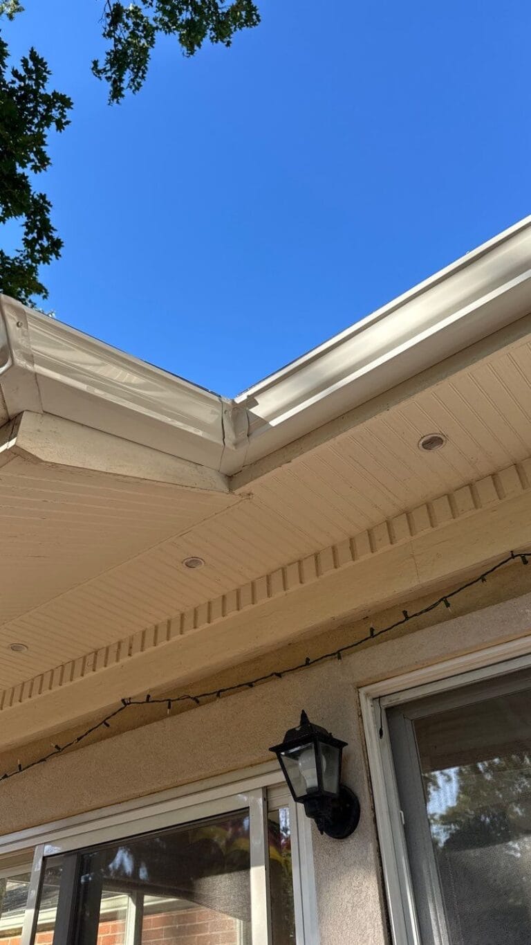 Fascia and soffit installation under roofline