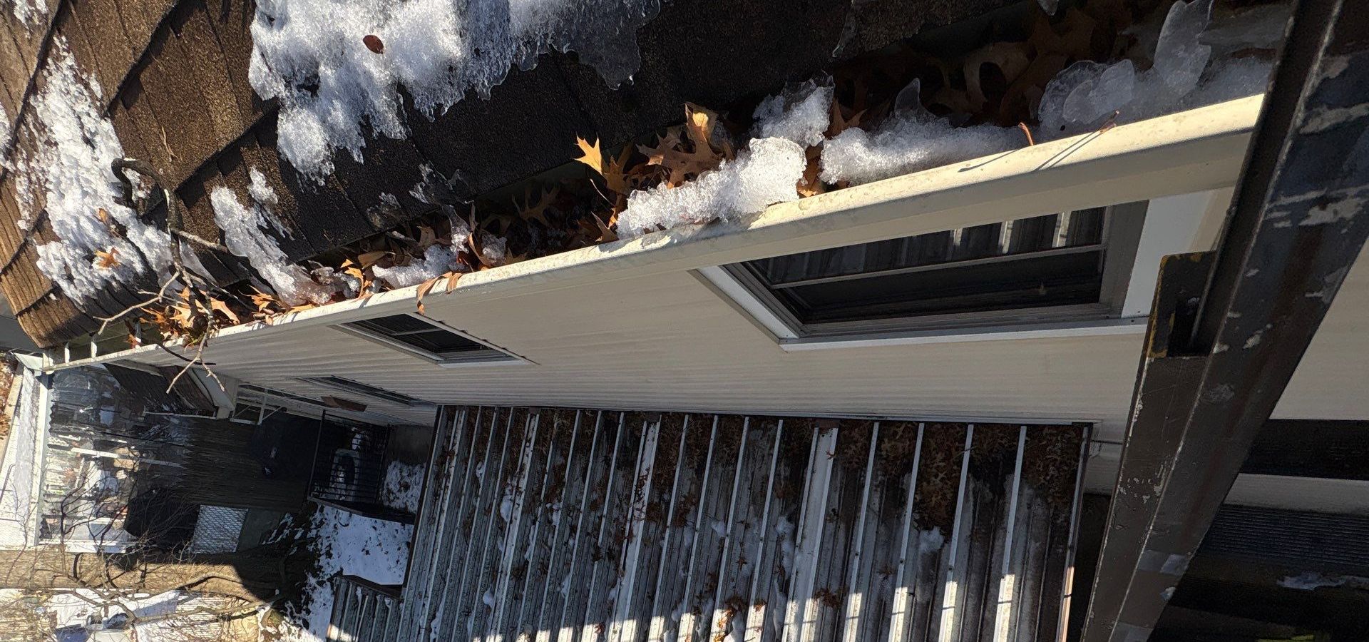 How Gutters Mitigate Snowmelt Damage to Roofs
